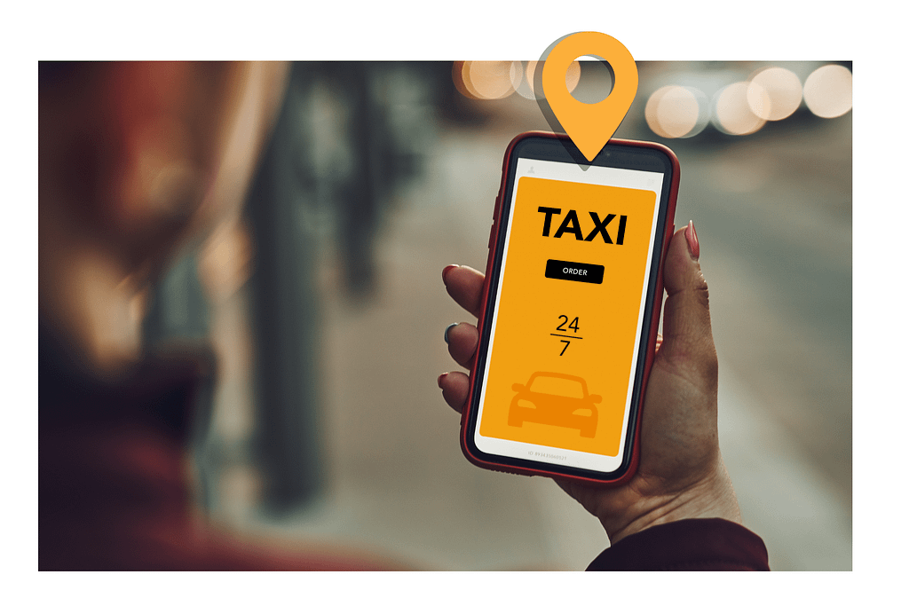 A phone being held showing a taxi bookinga app.
